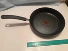 New T-fal Ultimate Hard Anodized Alum Titanium Non Stick Thermo Spot 10" Fry Pan. Price: $42.00.