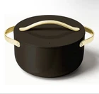 Nib Black / Gold Caraway Nonstick Ceramic Dutch Oven Pot (6.5 Qt, 10.5") New. Price: $175.00.