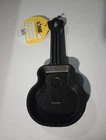 Lodge Logic Guitar Shaped Mini Skillet New. Price: $25.00.