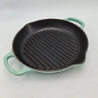Crueset Cast Iron Enameled Signature Grill Pan 9 3/4IN Round Caribbean Green Used. Price: $49.95.