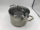 Emeril 3-QT. Sauce Stock Pot W/glass Lid. Tri-ply Copper Core. Stainless Used. Price: $27.00.