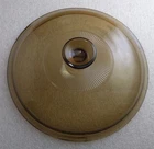Pyrex V-33-C Amber Replacement Lid For Corning 2.5 Qt Ribbed Casseroles Used. Price: $8.00.
