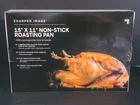 New Box Sharper Image Nonstick Roasting Pan With Carving Knife Fork & Baster. Price: $28.00.