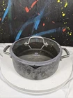 Calphalon 5-QT Dutch Oven And Cover Plus Steam Poach Basket #8785 Used. Price: $41.99.