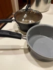 Cuisinart 54C-11BK 3 Piece Ceramica Cookware Saucepans 2 And Lid Used. Price: $20.00.
