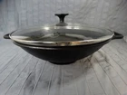 Lodge P14W Cast Iron 14.5" Wok With Lid Flat Bottom Loop Handles Made In Usa Used. Price: $70.69.
