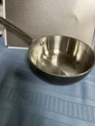 All Clad Sauce Pan Black No Lid 1-2 Qt. Used. Price: $45.99.