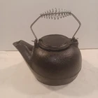 Vintage Carolina Cooker Cast Iron Tea Kettle Black Swivel Lid Used. Price: $45.99.