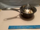 New Anolon Nouvelle Copper Lux Hard Anodized Non Stick 1.5 Qt Covered Sauce Pan. Price: $65.00.