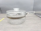 Pyrex Glass Flame Ware 1/2 Quart Sauce Pan 6213-B With Double Locking Lid Used. Price: $39.99.