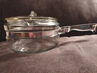 Pyrex Flameware 1/2 Quart Sauce Pan With Double Locking Lid 6213-B Used. Price: $34.99.