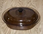 Visions By Corning Amber Dutch Oven Roaster 4QT W/lid V-34-B 12" X 3/4" V-34-C Used. Price: $35.00.