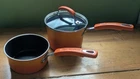 Rachael Ray Porcelain Cookware Orange Ombre' Sauce Pan Set W/ Lid 2 Qt & 1 Used. Price: $24.99.