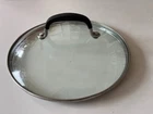 Simply Calphalon Tempered Glass Lid 9.25" X 8.5" W/black Insulated Handle Used. Price: $12.00.