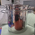 Kirkland Signature Professional 12 Qt Stock Pot W/ Steamers & Lid Korea Used. Price: $118.00.