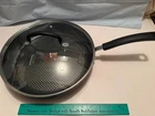 New T-fal Ultimate Hard Anodized Titanium Non Stick Thermo Spot 12" Cov Fry Pan. Price: $59.00.
