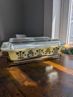 Pyrex 575-B 2 Qt Yellow Floral Glass Casserole Dish With Lid And Metal Rack Used. Price: $125.00.