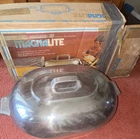 Magnalite Big Oval Roaster 13 Qt Aluminum Silver Roasting Tray W/ Lid Used. Price: $300.00.