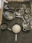 13 Pieces Calphalon Classic Hard Anodized Nonstick Cookware Used. Price: $180.00.