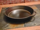 Lodge 15" Dual Handle Smooth Cast Iron Seasoned Pan New. Price: $104.99.