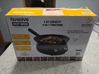 Nuwave Induction Hot Wok With Glass Lid & Stand 14" Carbon Steel Used. Price: $89.99.