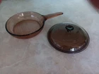 Corning Vision Amber Glass 7" Skillet Frying Pan Waffle Bottom Pyrex Lid Used. Price: $19.99.