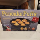 Vtg New Cast Iron 7 Pancake Puffs Seen Tv Non-stick. Price: $19.00.