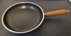 Vintage Mirro Enterprise 10 Skillet Pan Wooden Handle 54221-1330 Manitowoc Wi. Used. Price: $24.99.