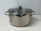 Wearever Stainless Steel 5.5 Qt Stock Pot W/ Double Pour Spouts & Strainer Lid Used. Price: $39.99.