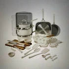 The Pioneer Woman Sutton 34PC Ceramic Nonstick Cookware And Bakeware Set - Cream New. Price: $160.00.
