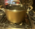 New Anolon Advanced 4.5-QT. Sauce Pan With Lid And Original Box. Price: $52.00.