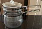 Vintage Pyrex Flameware Glass Double Boiler 6763L Used. Price: $44.94.