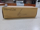 Pampered Chef Citrus Press, Coated Aluminum, White #2595 Nib. New. Price: $18.99.