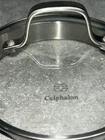 Calphalon Glass Strainer Vent 6.25 Inside 7 Out Diameter Sauce Pan Lid 0512616 Used. Price: $12.50.