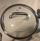 Pampered Chef Glass Pot Lid With Stainless Steel Rim And Vent, 9-1/2 Inch D. Used. Price: $12.99.