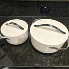 Caraway Cream Ceramic Four-piece Set Non-stick Saucepan Casserole With Lids Used. Price: $180.00.