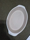 The Pampered Chef Family Heritage Stoneware # 210305 Small Baking Dish Used. Price: $9.00.