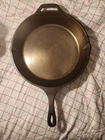 Polished Lodge 12SK Cast Iron Skillet - Smooth Surface Used. Price: $120.00.