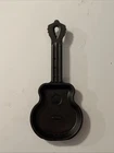 Lodge Guitar Cast Iron Skillet Used. Price: $17.50.