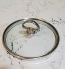 Chantal 17 Stl Steel Glass Pot Pan Lid 6 3/4 Total Diam. For 1/4 Inside Used. Price: $10.00.