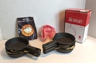 Modern Innovation Mini Cast Iron Skillets With Silicone Mitt Set Of 7 New. Price: $9.95.