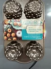 Pioneer Woman Timeless Nonstick Floral Cakelet Pan! New. Price: $29.99.
