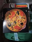 12" Diamenter Paella Dish Terra Cotta (boston Warehouse) Model #09-134 (1992) New. Price: $45.00.