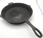 Bayou Classic 14 Inch Double Handled Cast Iron Skillet With Pour Spouts Black Used. Price: $35.06.