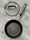Calphalon Non-stick Quart Saucepan #8701 With Glass Lid Insulated Handle Euc Used. Price: $24.99.
