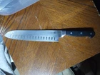 Wolfgang Puck 9" Santoku Knife Full Tang 032007 Used. Price: $8.00.