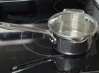 Emeril (all-clad) 1.5 Stainless Steel Saucepan W/ Lid, Long Handle Used. Price: $65.00.