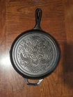 Lodge Cast Iron 10.25" Seasoned Year Of The Dragon Skillet New. Price: $80.00.
