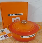 Le Creuset Cast Iron 2.75 Quart Shallow Round Dutch Oven, Flame - New. Price: $239.95.