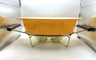 Vtg Pyrex Seville Orange Oval 2.5 Qt Casserole Dish Warming Stand Candle No Lid Used. Price: $29.99.